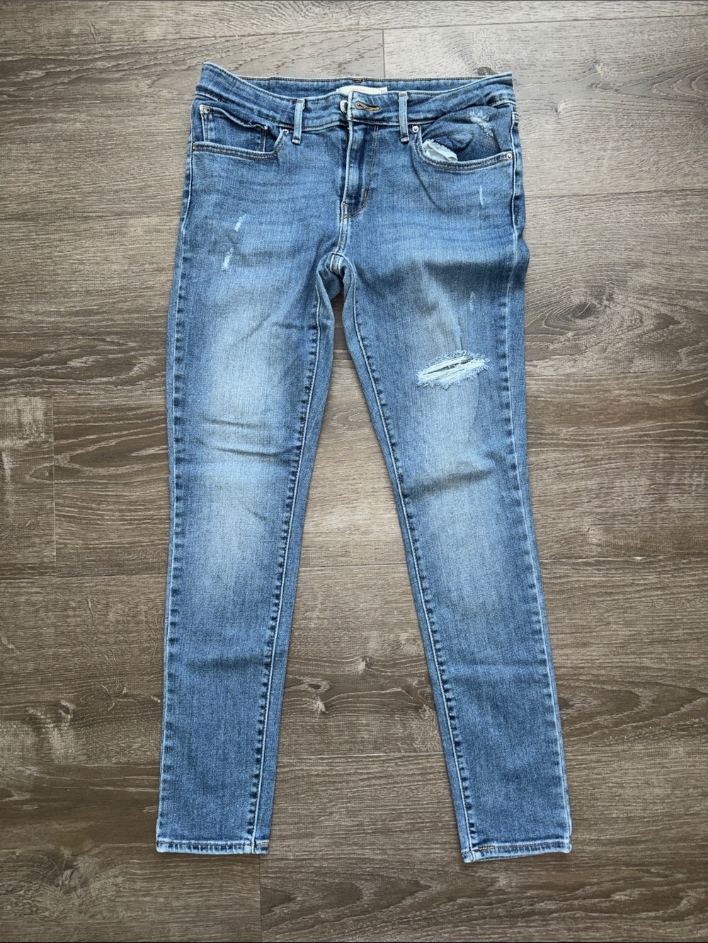 Levi's Women's Light Blue Skinny Jeans with Subtle Distressing
